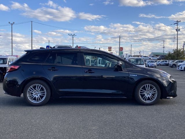 TOYOTA COROLLA TOURING HYBRID 4WD 2019